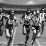 Women racing in a relay race competition