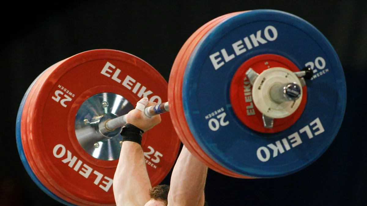 Eleiko weightlifting barbell with plates
