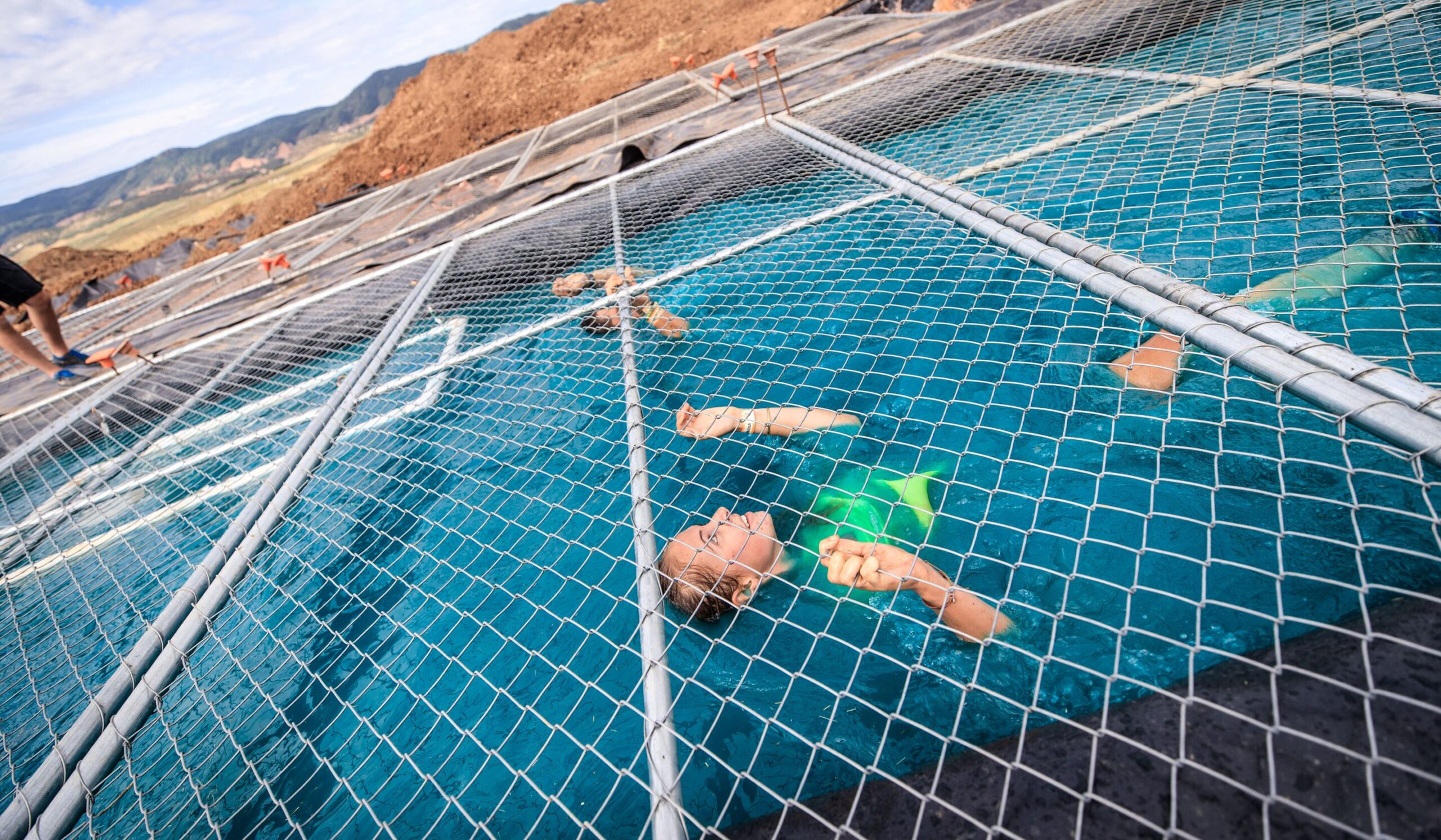 Tough Mudder Cage Crawl Obstacle